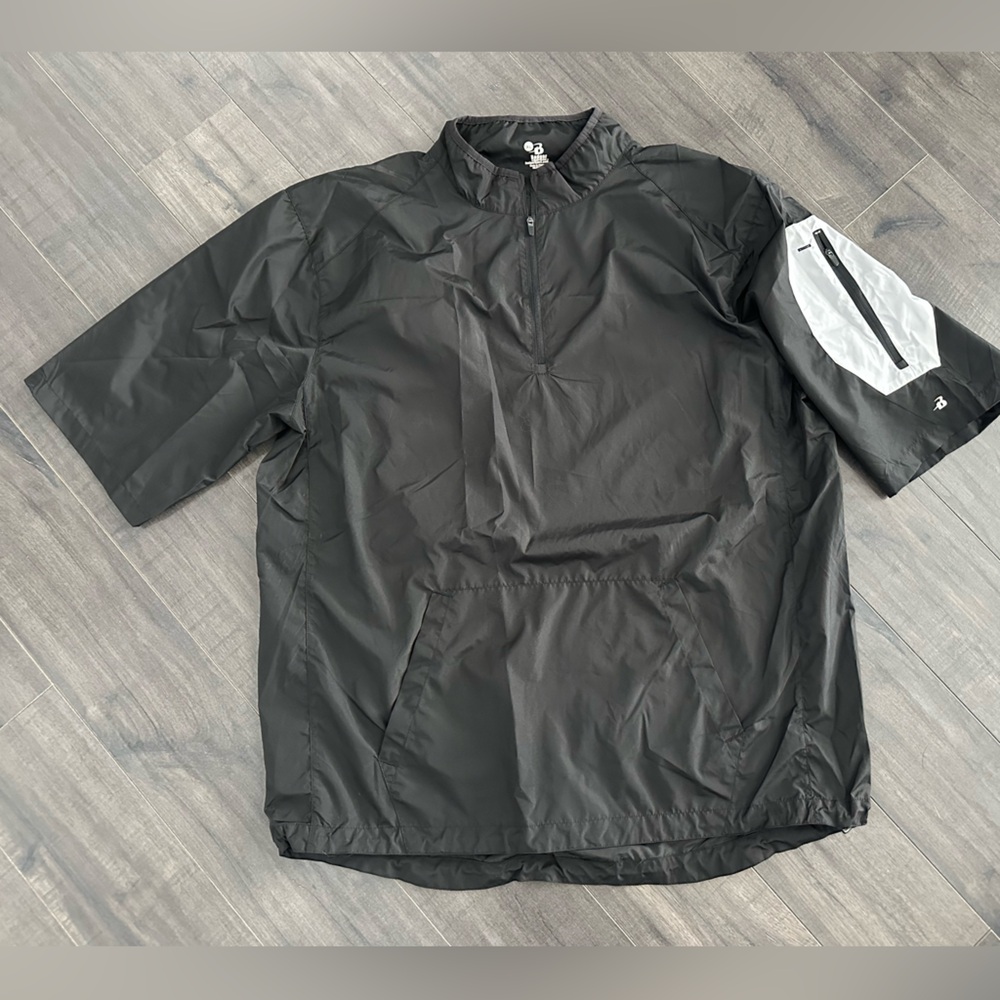 New. Mens XL pullover windbreaker